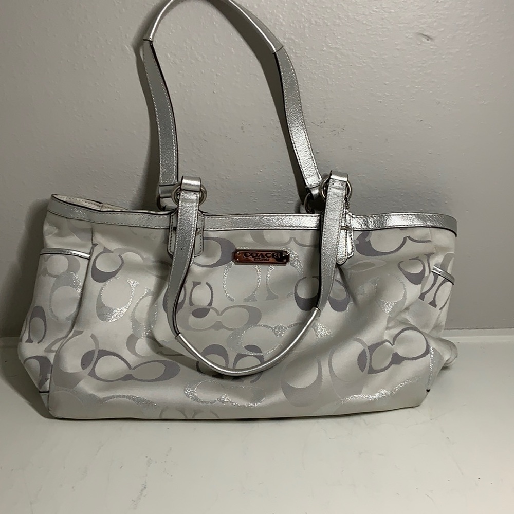 Women’s silver Coach bag